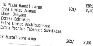 Ausschnitt eines Kassenbons mit Pizzaauflagen und getrennten Extras für die linke und rechte Pizzahälfte